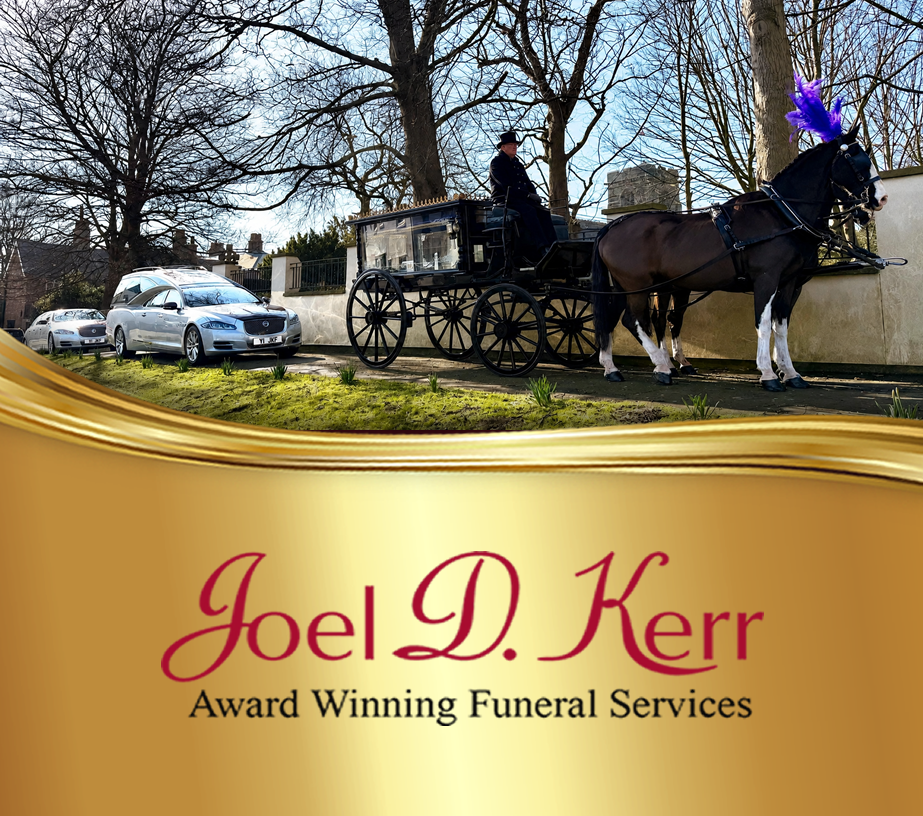 Black horse drawn funeral carriage